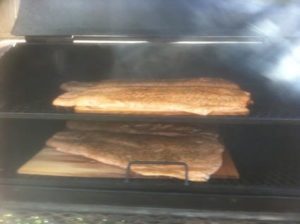 Sometimes we'll put four salmon on the smoker. If you are heating up the wood, you might as well cook a bunch. It gets eaten. Salmon salad sandwiches the next day are heavenly too.